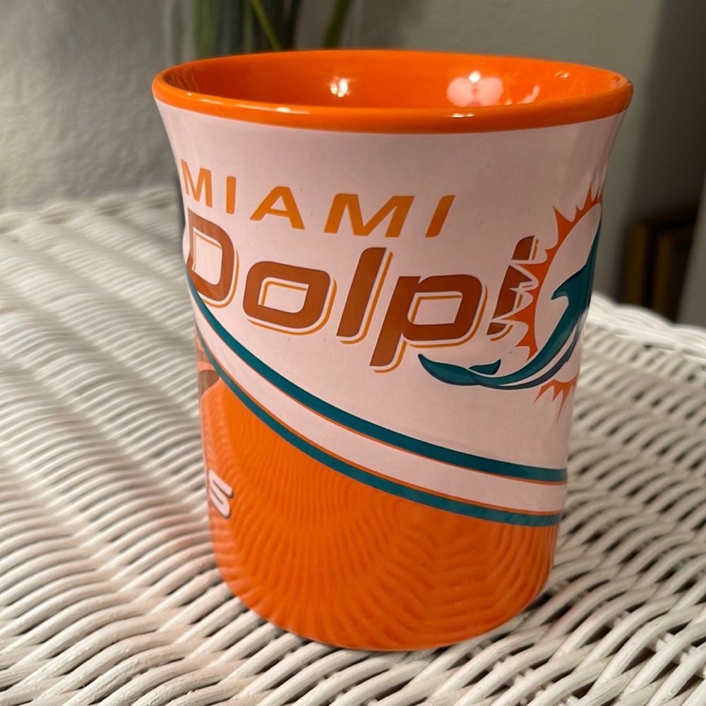 NFL MIAMI DOLPHINS MUG. Brand new. Orange. Still has official NFL sticker on it